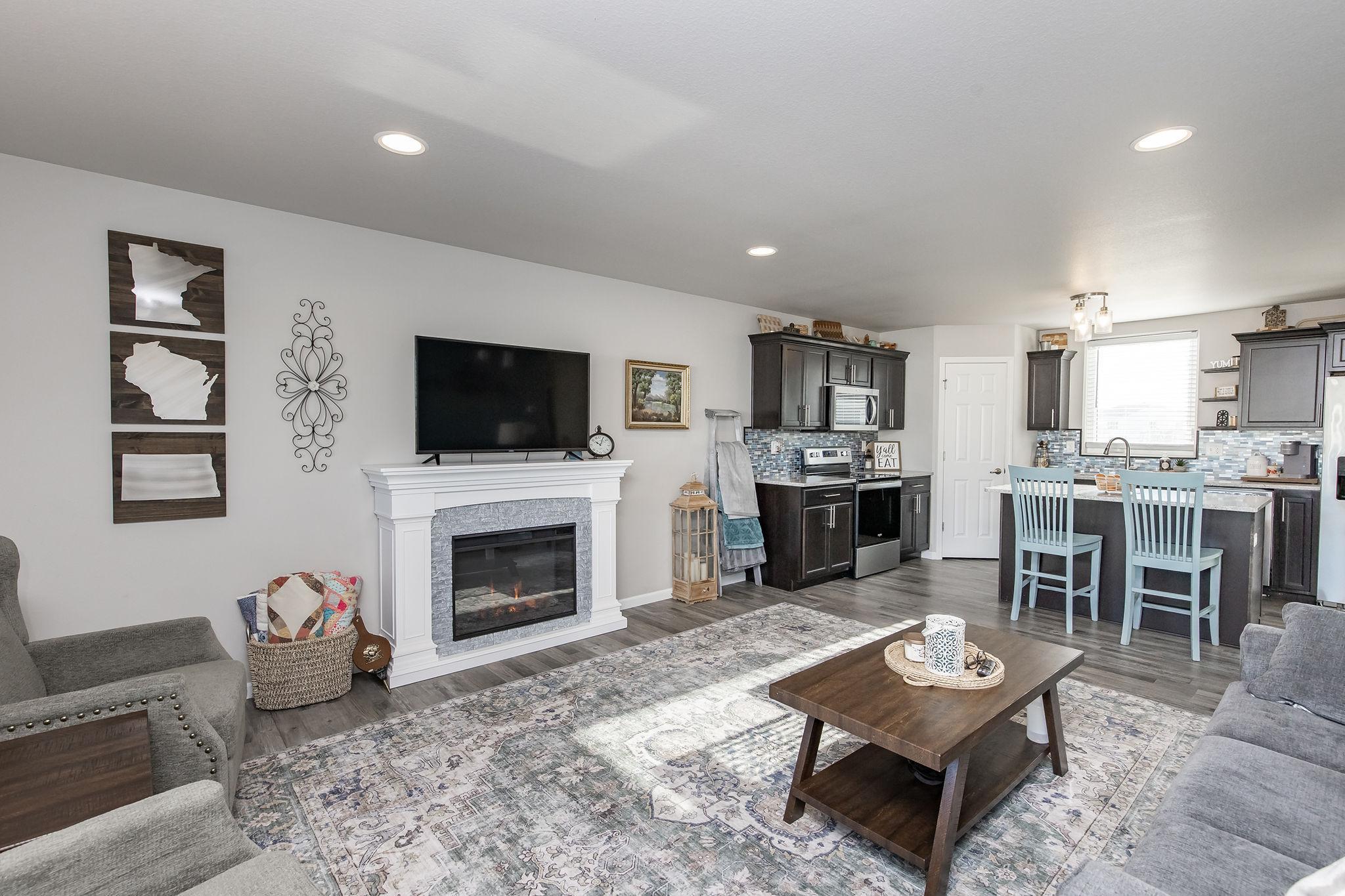 Living Room w/ Electric Fireplace