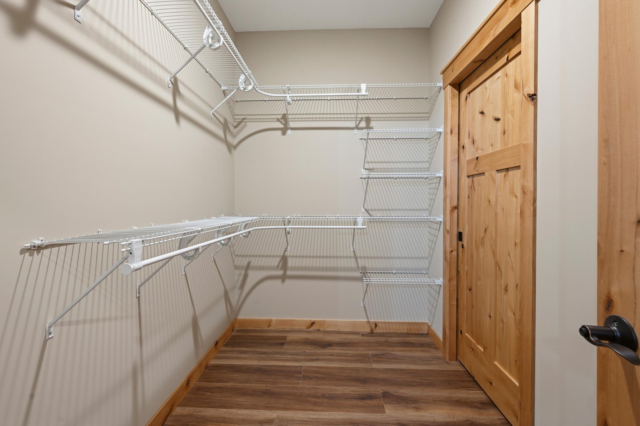 Primary Closet can be accessed through the mudroom or the primary bathroom