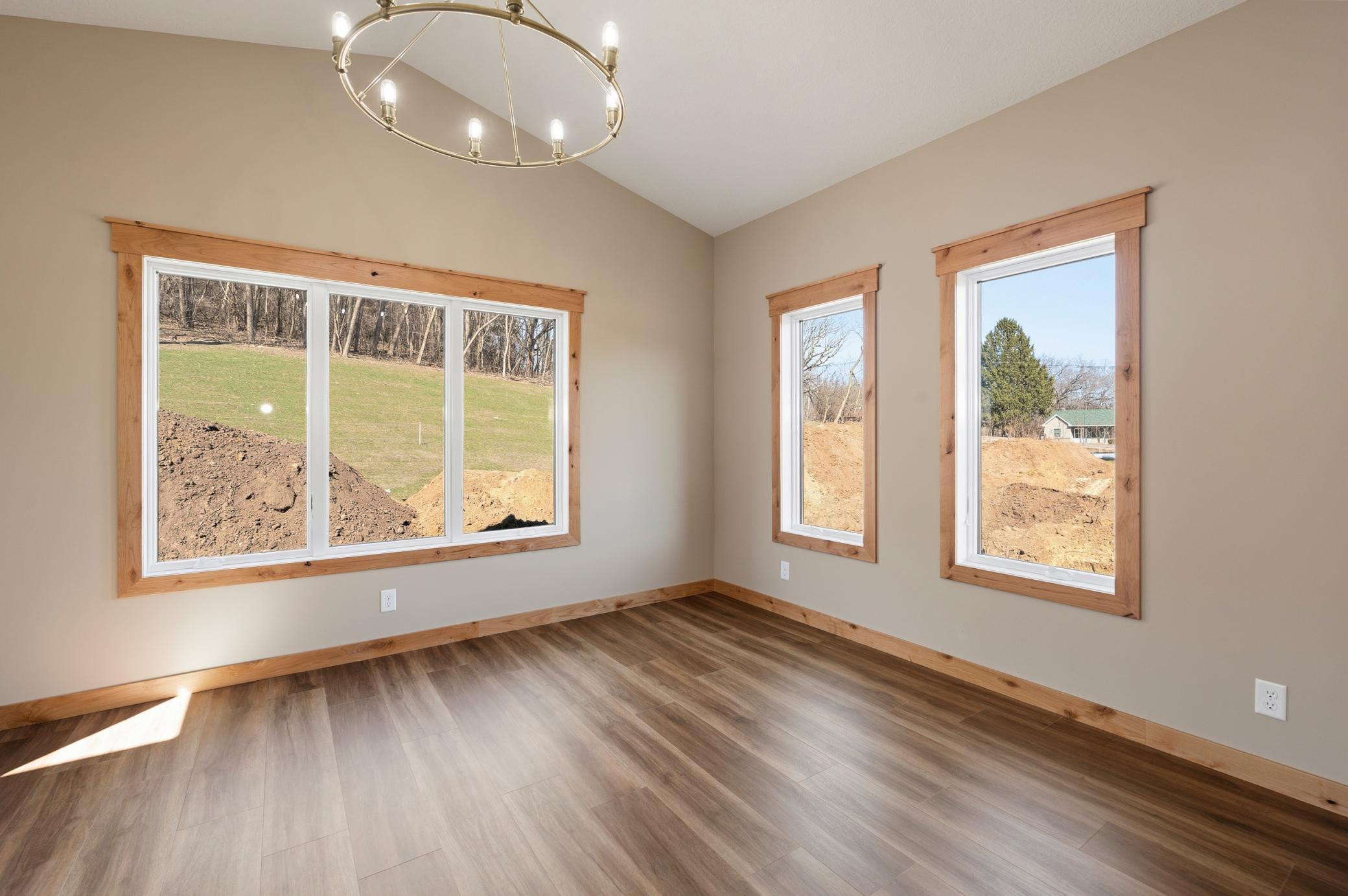Sunroom with views of the woods behind!