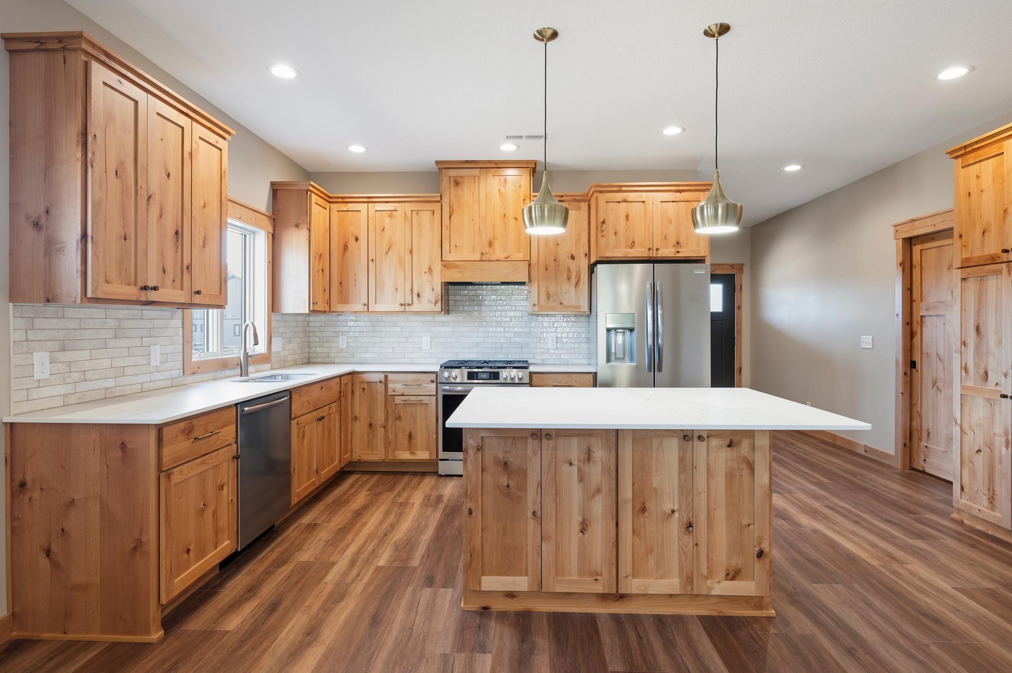 Knotty Alder cabinets and an oversized island!
