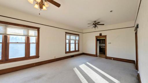 Huge formal living room leads to the kitchen, south facing windows make this an inviting space