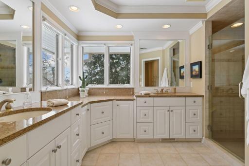Large bath with a big tile shower & lots of light!