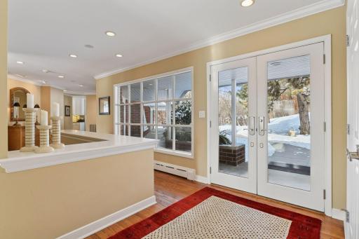 Sunny front entrance with lots of natural light and a handy coat closet.