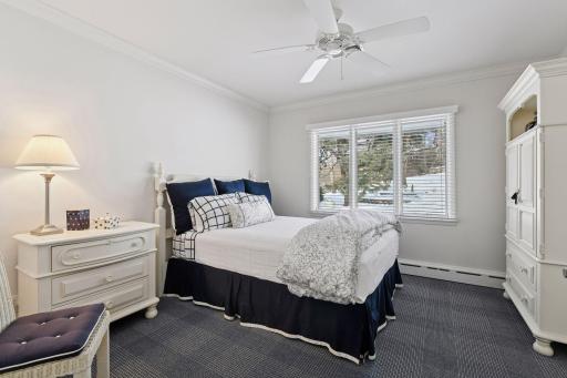 The second main floor bedroom features an updated attached full bath.