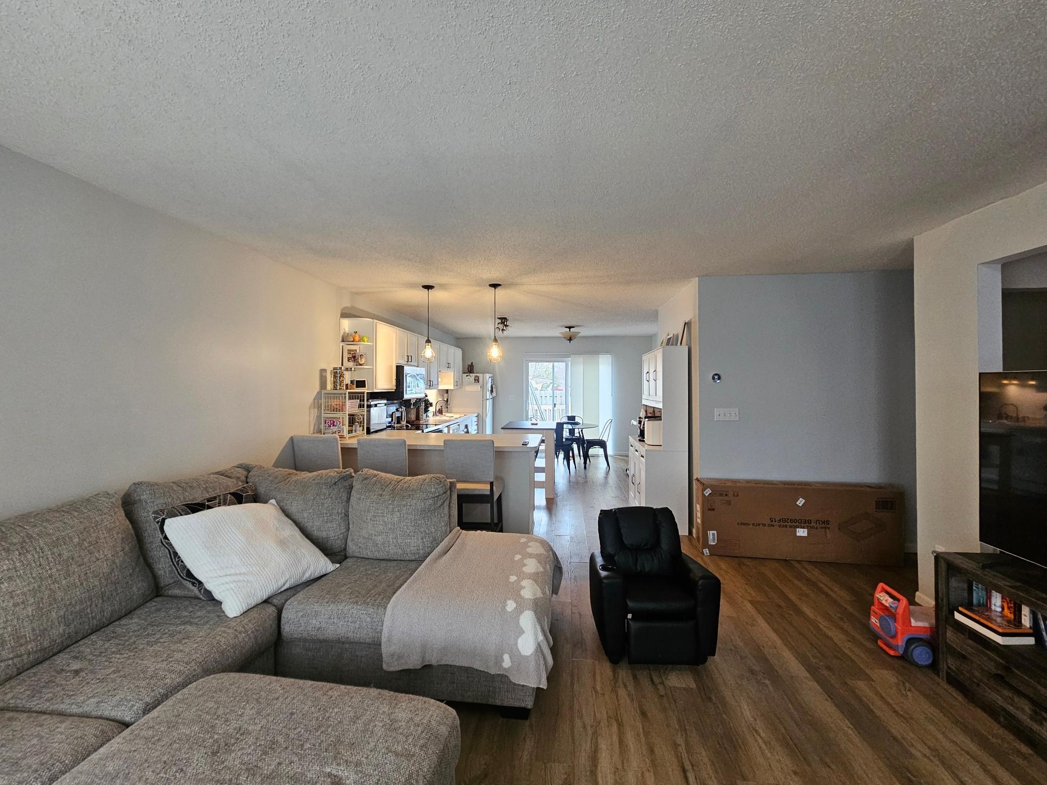 Living room looking into kitchen