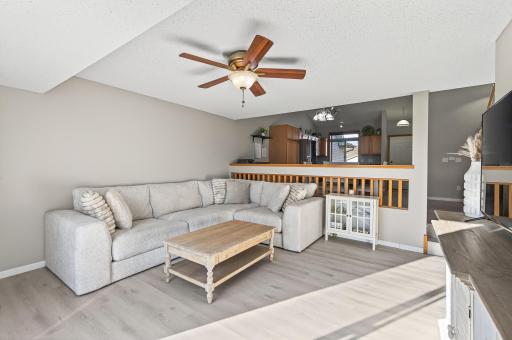 Inviting living space with neutral finishes, updated flooring, and a flexible layout for relaxing or entertaining.