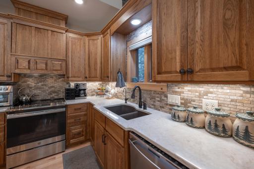 Underlit cabinets with custom backsplash