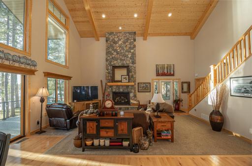 Floor to ceiling hand stacked stone fireplace