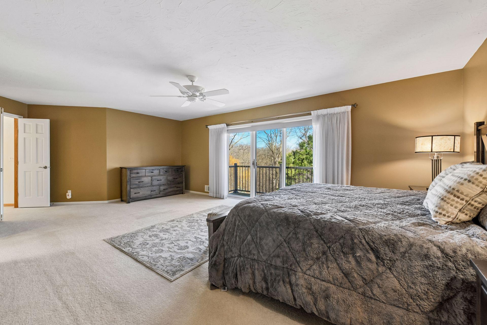 Another angle of the primary suite highlighting the double door entry!