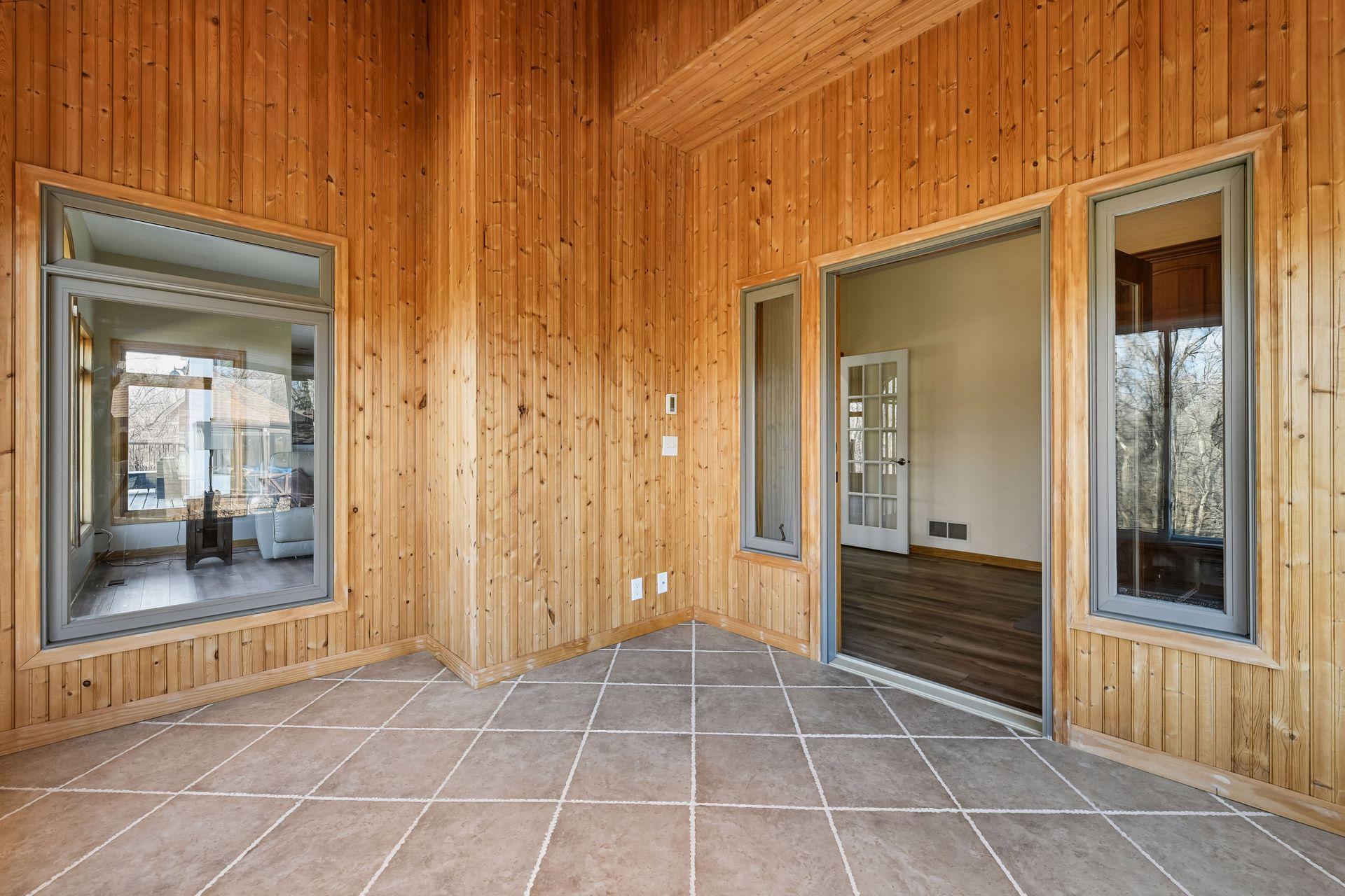 Another angle of the amazing 4- season porch/sunroom! Check out the amazing tall ceilings!