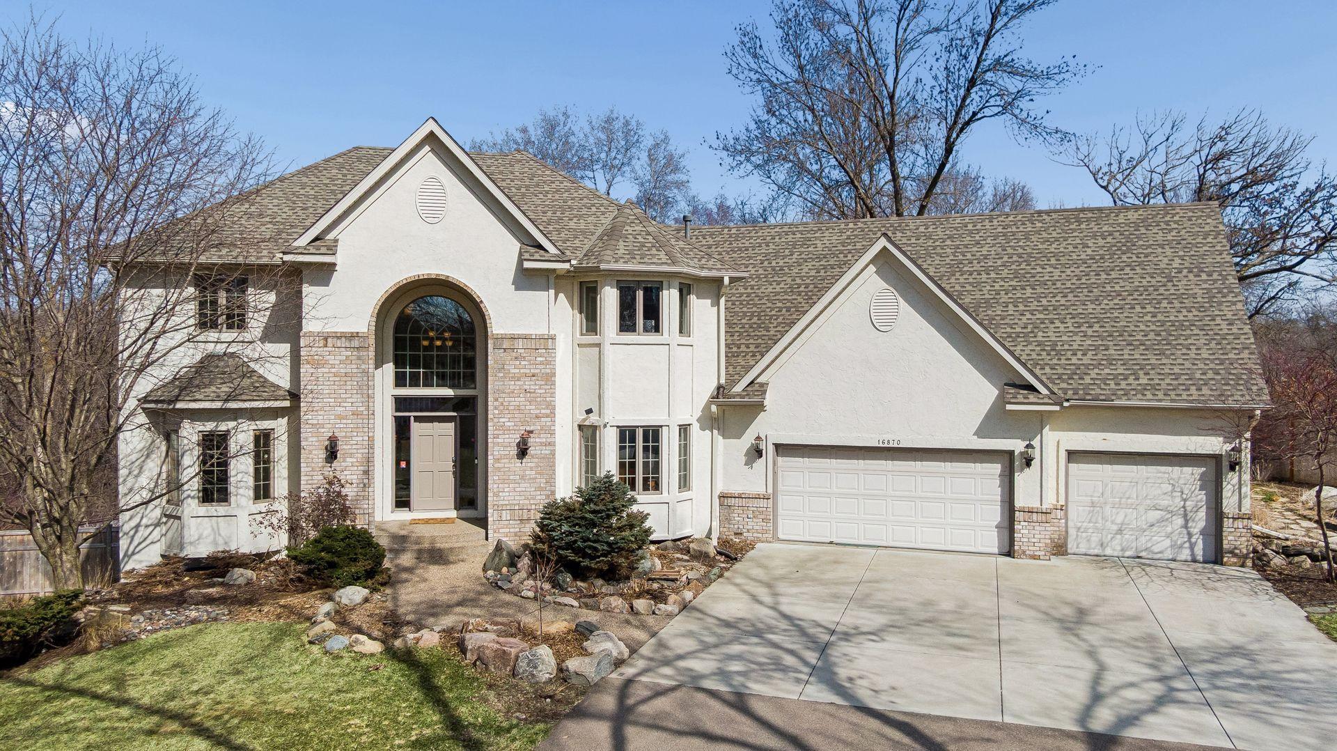 This beautiful home features grand arched entries, sun-drenched bays, and a large 3-car garage!