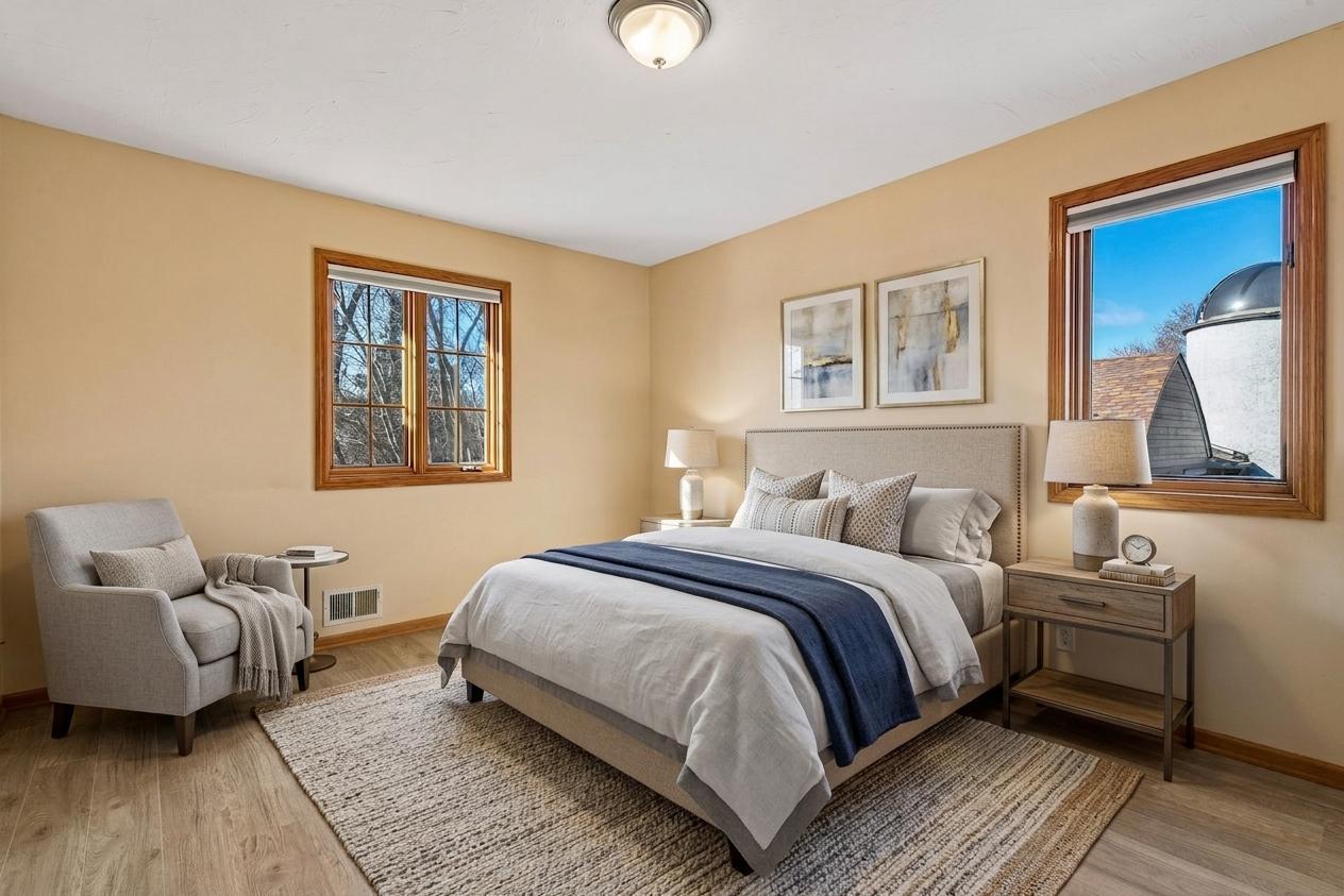 Bedroom #3 is another generously sized upstairs space with beautiful hardwood floors! *Virtually staged to show design options.
