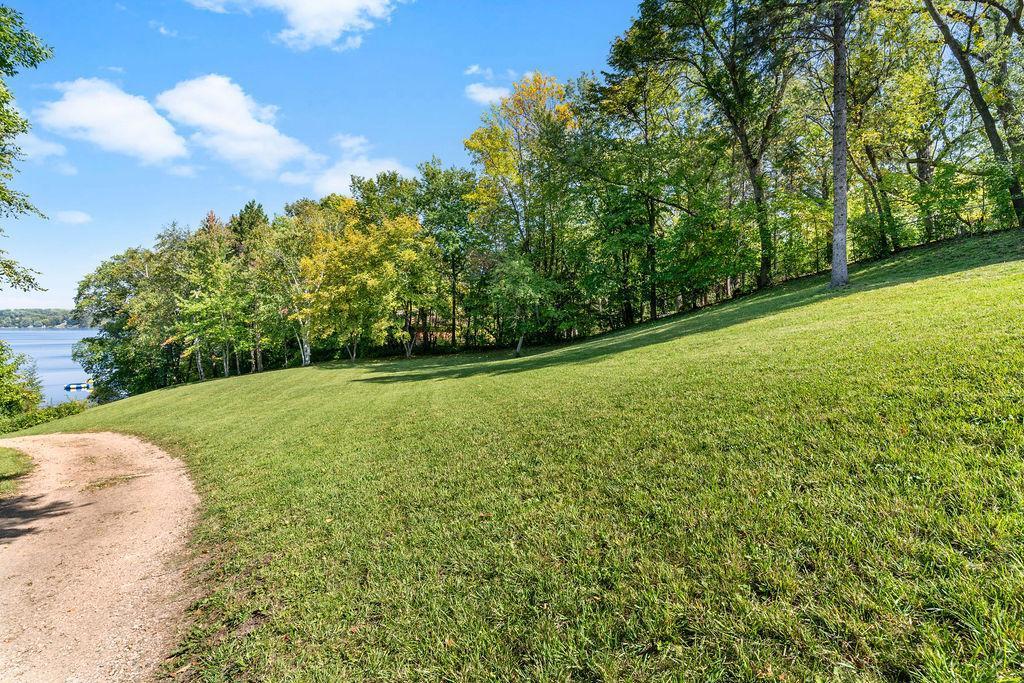 Elevated positioning provides expansive, panoramic views of the lake.