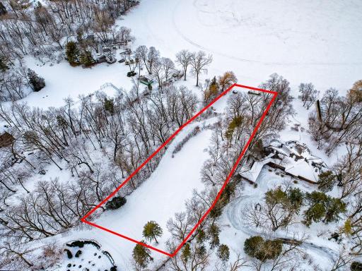 120 feet of beautiful, sandy shoreline along the lakeâs highly desirable southern edge.
