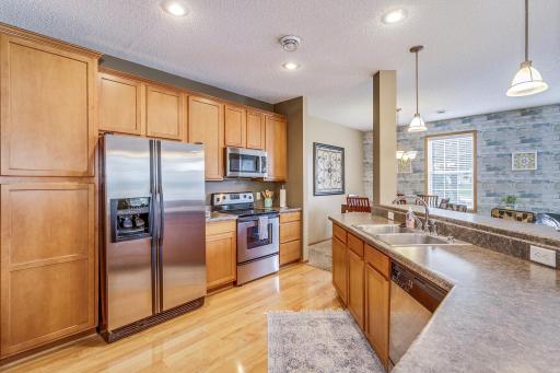Photo for 10808 Hawthorn Trail, A, Woodbury, MN 55129 - listing #6817992 Beautifully updated end-unit townhome in Woodbury! The beautiful and spacious Kitchen features stainless steel appliances. A wonderful space to prepare your family meals.