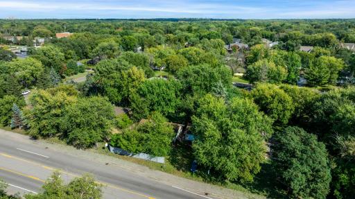 Conveniently located near shopping, dining, and parks, this property is perfect for buyers looking to create their dream home through remodeling.