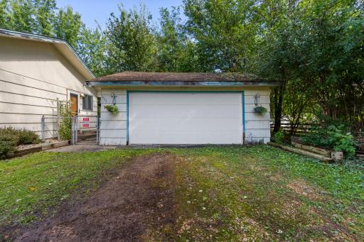 A detached two-car garage adds to the home’s appeal.