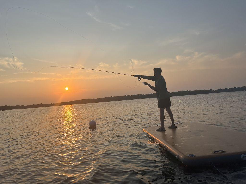 Cast a line from shore. Fishing on Lake John is great!