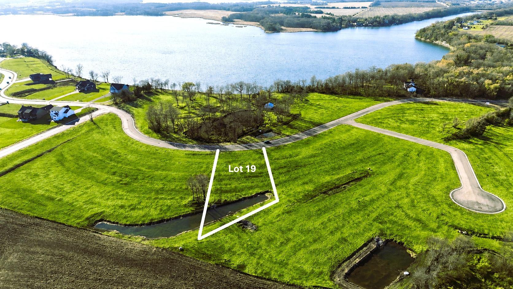 A rare opportunity to own this oversized 0.92 Acre lookout lot, 90 feet wide on Lake John Drive.