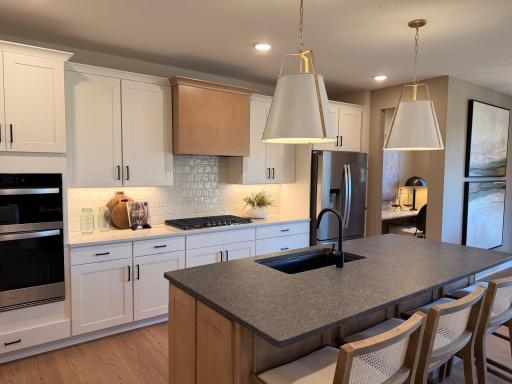 Photo for 16460 Comstock Lane N, Dayton, MN 55369 - listing #6818473 Bright and spacious kitchen featuring ample cabinetry, sleek countertops, and a functional layout—perfect for everyday living and entertaining.