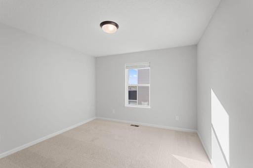 Second Bedroom (Photo of similar home - Colors and selections will vary)