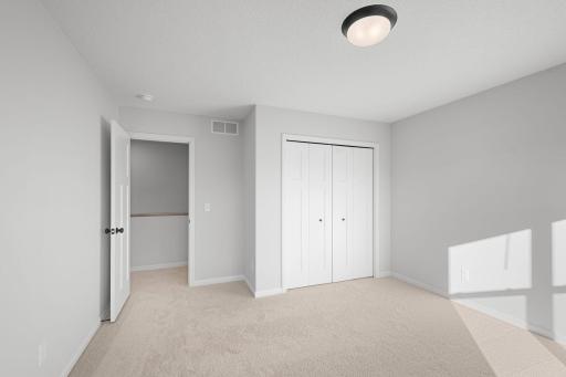 Second Bedroom (Photo of similar home - Colors and selections will vary)