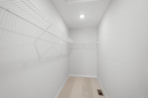 Owner's Closet (Photo of similar home - Colors and selections will vary)
