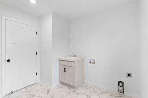 Laundry Room (Photo of similar home - Colors and selections will vary)