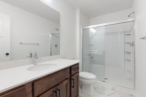 Lower Level Bathroom (Photo of similar home - Colors and selections will vary)
