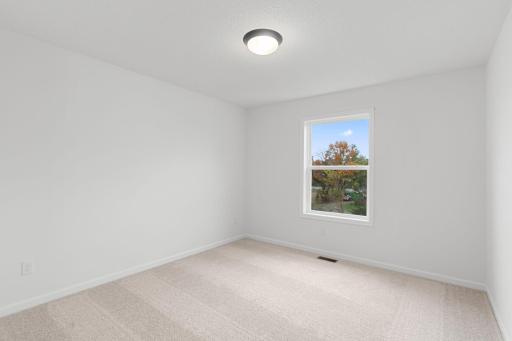 Second Bedroom (Photo of similar home - Colors and selections will vary)