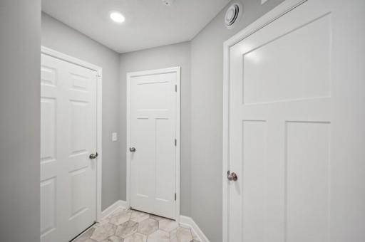 Mudroom area offers entry closet and HVAC area.
