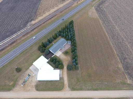 Property's 4.75 acre include shop &house plus another parcel of 3.5 acres of field to the east.