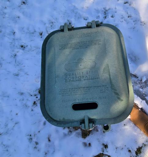 In the front yard to the west of the driveway is the buried 1000 gallon propane tank. Used for heat in the house & sheds.