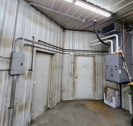 West exit door by furnace and left door leads into the 90 x 40 cold storage shed.