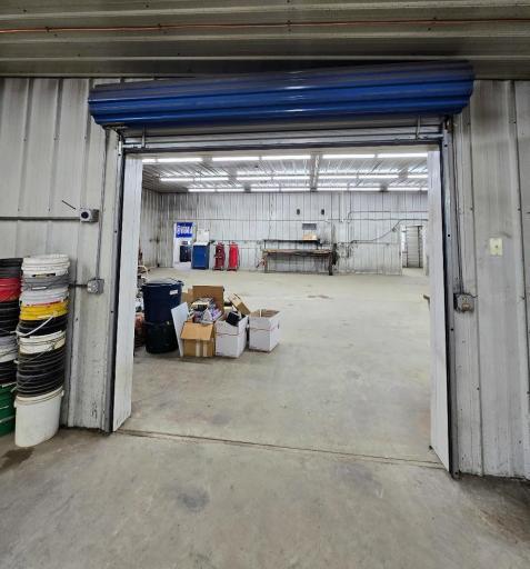 Roll up door b/w 56x45 machine shop & center shop area (1516 sq ft of heated shop)