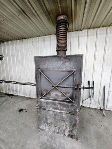 Wood stove that heats the water for the boiler for the infloor heat.