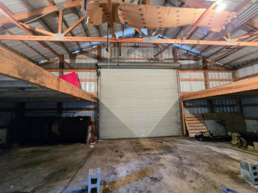 This door faces east 12 x 14. Seller used this part of the shed to paint, & misc storage.