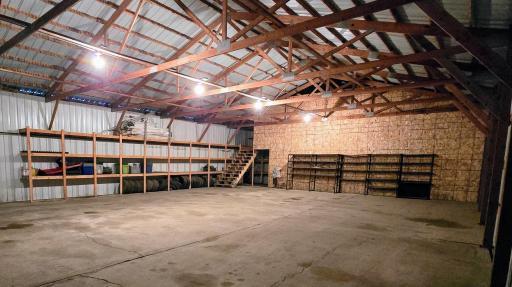 Additional storage added with upper and main floor shelving