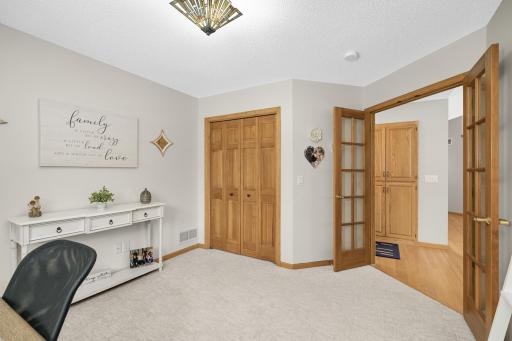 French doors lead to the main floor office with a closet. Can be used as a 4th bedroom, if needed.