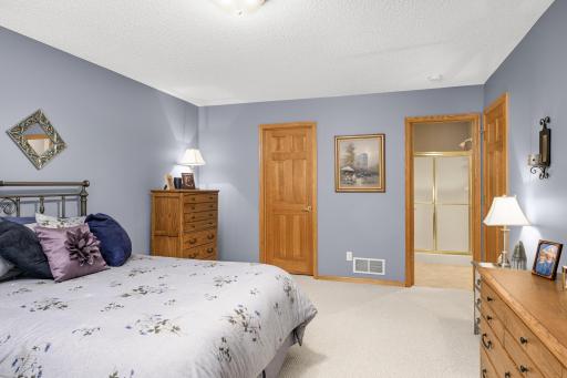 This bedroom offers a walk-in closet and walk through door to the lower level 3/4 bathroom.