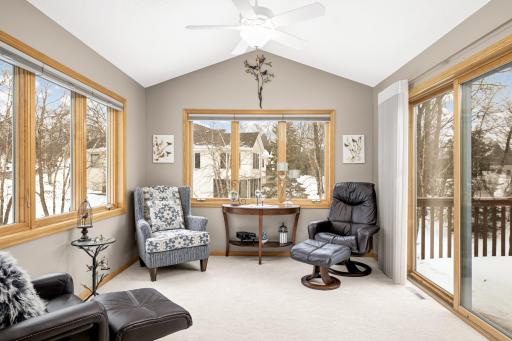 Enjoy and relax in your sunroom. Patio doors leading to the deck.