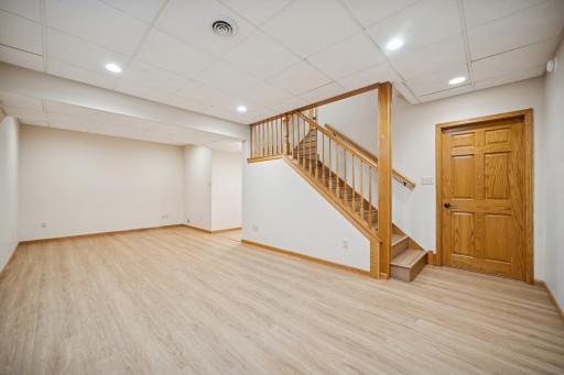 The lower level of this home is as wonderful as the upper two. Complete with a TV room, workroom, another bathroom and ample storage!