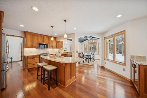 The hardwood and quality cabinetry add warth and richness to the kitchen and dining room.