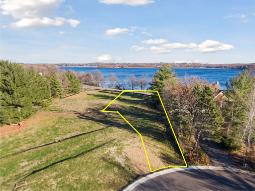 Enjoy long, easterly views over Lake Minnewashta. The outline shows the approximate location of the building site boundaries.