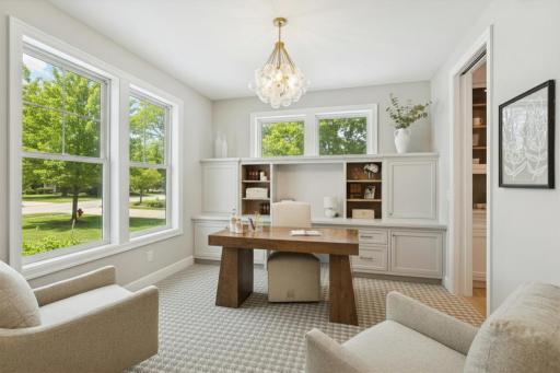 Designed for today's lifestyles, this floor plan features a main-level home office. Photo is of a previously constructed home.
