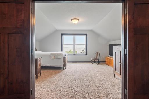 Double door entrance to Bedroom #2 in the upper level