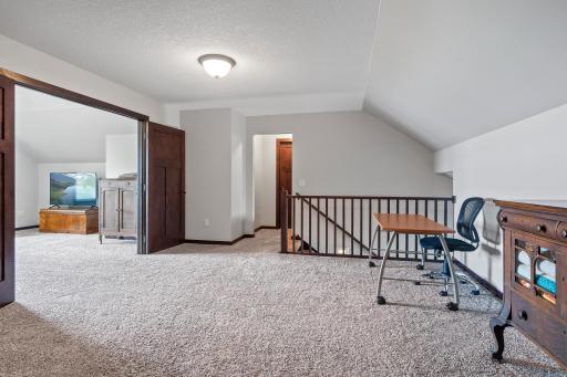 Upper level space for crafts, desk, games....