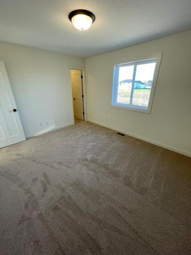 Bedroom 1 with Walk-In Closet!