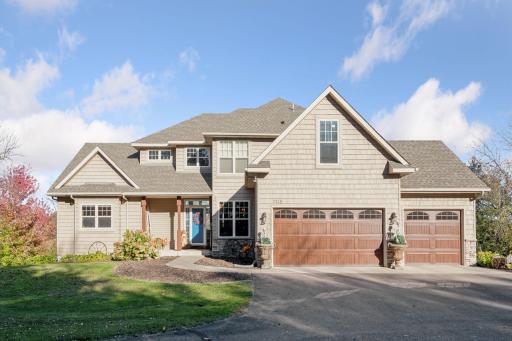 Wonderful walk-out two-story with one level living on 6.6 acres