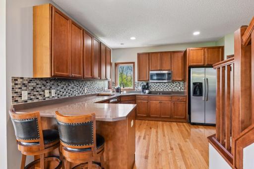 Stainless steel appliances and walk-in pantry